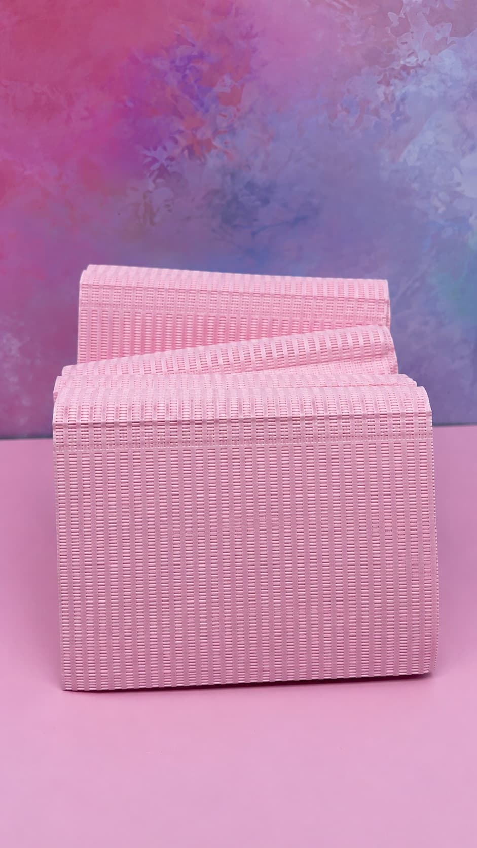 Mantel desechable rosa para mesa de manicura